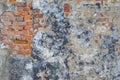 Grunge old red brick and plaster wall texture Royalty Free Stock Photo