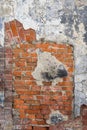 Grunge old red brick and plaster wall texture Royalty Free Stock Photo