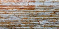 Grunge old rusted metall striped rusty panels background garage door Royalty Free Stock Photo