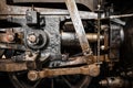 Grunge old steam locomotive wheels close up