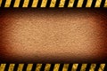 Grunge orange wall background with warning stripes Royalty Free Stock Photo