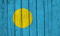 Palau Flag Over Wood Planks