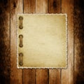 Grunge paper for invitation on the wooden background Royalty Free Stock Photo