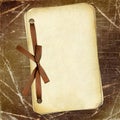 Grunge papers with bow on dark background Royalty Free Stock Photo