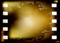 Grunge photographic film frame burned. Old vintage 35 mm film background with space for text. Old filmstrip. Movie ending frame.