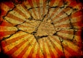 Grunge rays background with cracks