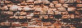 Grunge red bricks wall. Banner background Royalty Free Stock Photo