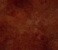 Grunge red brown marbled paper parchment with liquid faint and drips and empty center for your message.