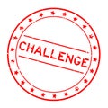 Grunge red challenge word round rubber stamp on white background