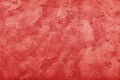 Grunge red painted plaster wall background Royalty Free Stock Photo