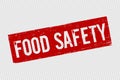 Grunge red food safety square rubber seal stamp