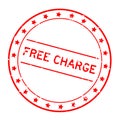 Grunge red free charge word round rubber stamp on white background