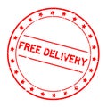 Grunge red free delivery word round rubber stamp on white background Royalty Free Stock Photo