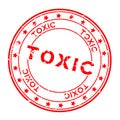 Grunge red toxic word round rubber stamp on white background Royalty Free Stock Photo