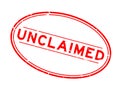 Grunge red unclaimed word oval rubber stamp on white background Royalty Free Stock Photo