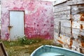 Grunge red wall aged weathered wood boat