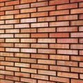Grunge red yellow beige tan fine brick wall texture background perspective textured pattern Royalty Free Stock Photo