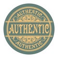 Grunge rubber gold stamp with the word Authentic written inside Royalty Free Stock Photo