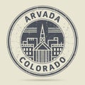 Grunge rubber stamp or label with text Arvada, Colorado