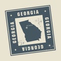 Grunge rubber stamp with name and map of Georgia, USA Royalty Free Stock Photo