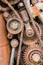 Grunge rusty gear wheels and other components of industrial mach Royalty Free Stock Photo
