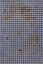 Grunge rusty old metal grill on wall as texture or background Royalty Free Stock Photo