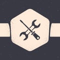 Grunge Screwdriver and wrench spanner tools icon isolated on grey background. Service tool symbol. Monochrome vintage