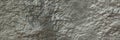 Grunge silver grey stone wall texture of cracked concrete rock or asphalt. Cement stone Royalty Free Stock Photo