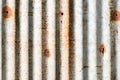 Grunge silver and red rust corrugated iron metal plate texture background
