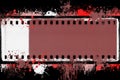 Grunge splashed film strip frame on black background. Graphic element. Royalty Free Stock Photo