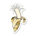 grunge sticker of tattoo style peeled banana