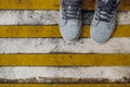 Grunge striped cunstruction background with footwear Royalty Free Stock Photo