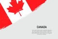 Grunge styled brush stroke background with flag of Canada Royalty Free Stock Photo