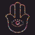 Grunge stylized colorful Hamsa on black background