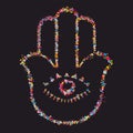 Grunge stylized colorful Hamsa on black background Royalty Free Stock Photo