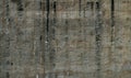 Grunge texture for background, gray wall in black smudges with climbing hooks. Fragment of a wall in, Calella, Spain