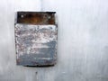 grunge texture of grey metal fence with dirty letterbox