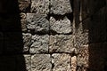 Grunge Texture of laterite stone wall and shadow. Background stone scene stone wall Royalty Free Stock Photo