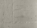 Grunge texture of an old plaster wall. Minimal background. Concrete surface with damages and scratches. Royalty Free Stock Photo