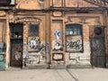 Grunge urban scene with door and graffiti Royalty Free Stock Photo