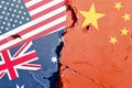 Grunge US (United States), Australia, China national flag isolated on broken wall background