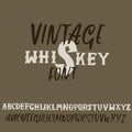 Grunge vintage whiskey font. Old handcrafted display skript. Modern brush label lettering. Vector typography Royalty Free Stock Photo