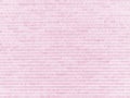 Pastel pink brick wall texture. Grunge background in loft style. Irregular pattern. Royalty Free Stock Photo