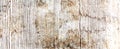 Grunge wall texture background. Paint cracking off dark wall with rust underneath Royalty Free Stock Photo
