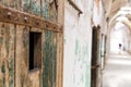 Grunge wooden bar door and in old prison. Royalty Free Stock Photo