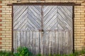 Grunge wooden door of old barn background Royalty Free Stock Photo
