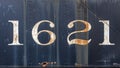 Grunge worn rusty metal background with chipped and faded painted numbers Royalty Free Stock Photo