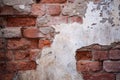 Grungy brick texture with some damaged plaster left behind