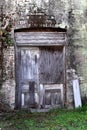 Grungy Curved Brick Entry With Woden Door