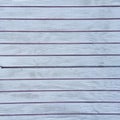 Grungy distressed white wooden textured fence